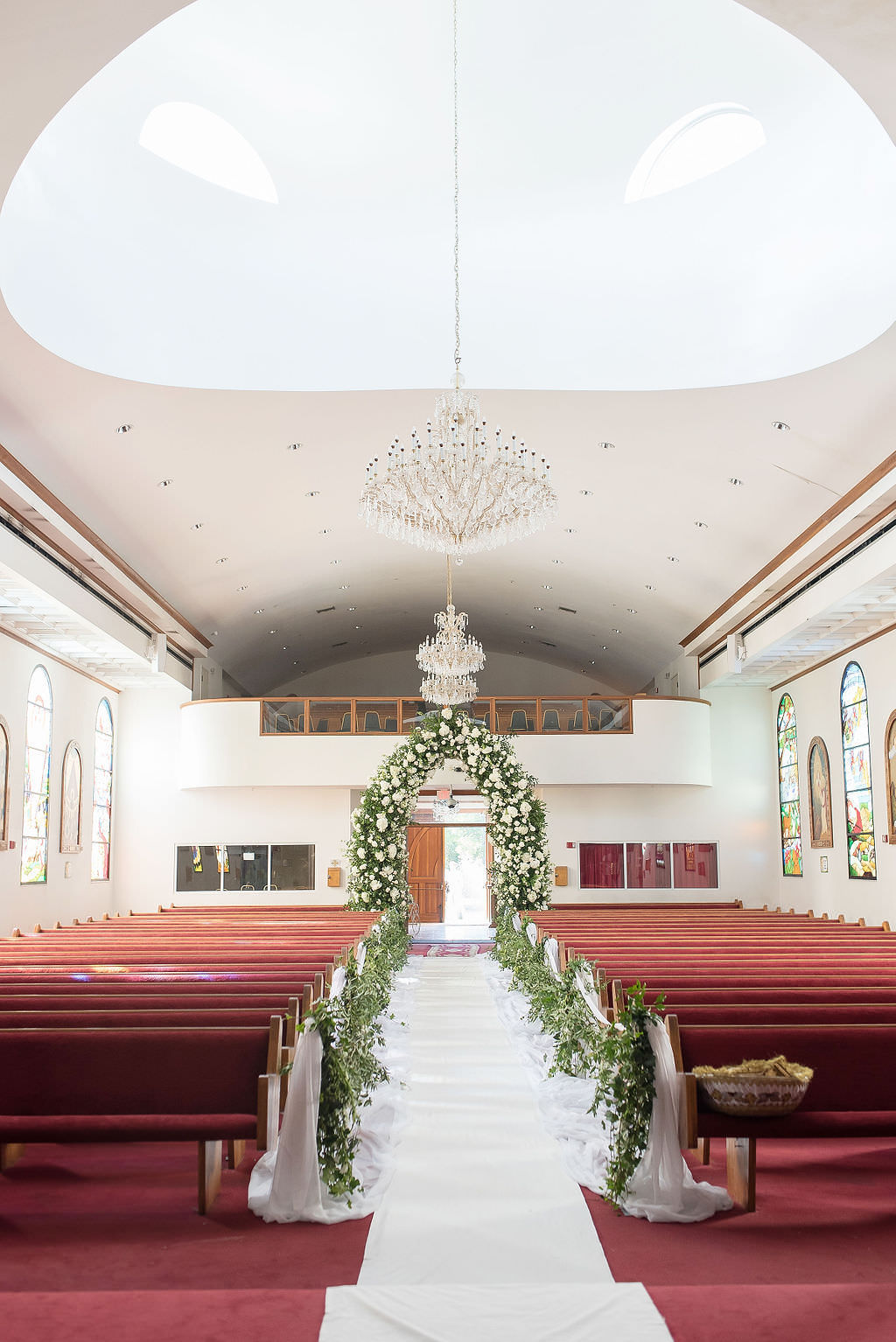 Stunning Classic Elegant White Ivory and Greenery Wedding Ceremony Floral Arch Entrance | Tampa Bay Wedding Photographer Kristen Marie Photography | Traditional Wedding Ceremony Venue St. George Coptic Orthodox Church | Clearwater Wedding Florist Gabro Event Services