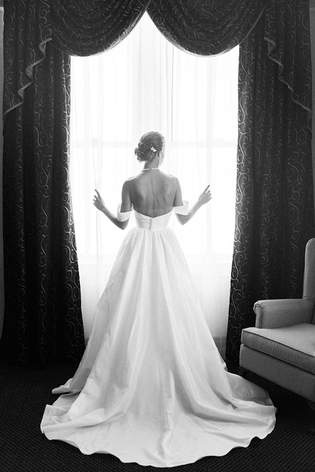 Classic Florida Bride Black and White Portrait, Looking Out the Window, Wearing Ballgown Style Wedding Dress by Wtoo by Watters, Style Mimi