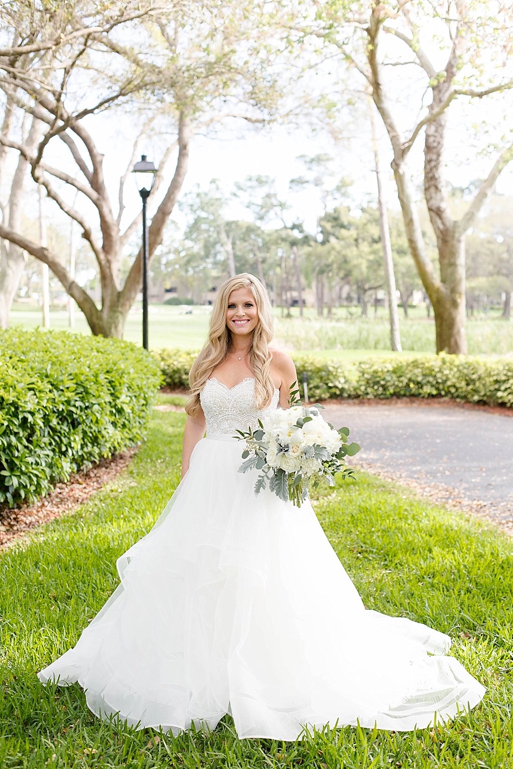 Florida Beauty Bridal Wedding Portrait in Wtoo Watters Lace Sweetheart Neckline Strapless Bodice, Tulle Ballgown Skirt Wedding Dress, Ivory, White, Dusty Miller and Greenery Floral Bouquet | Tampa Bay Wedding Hair and Makeup Artist Femme Akoi Beauty Studio