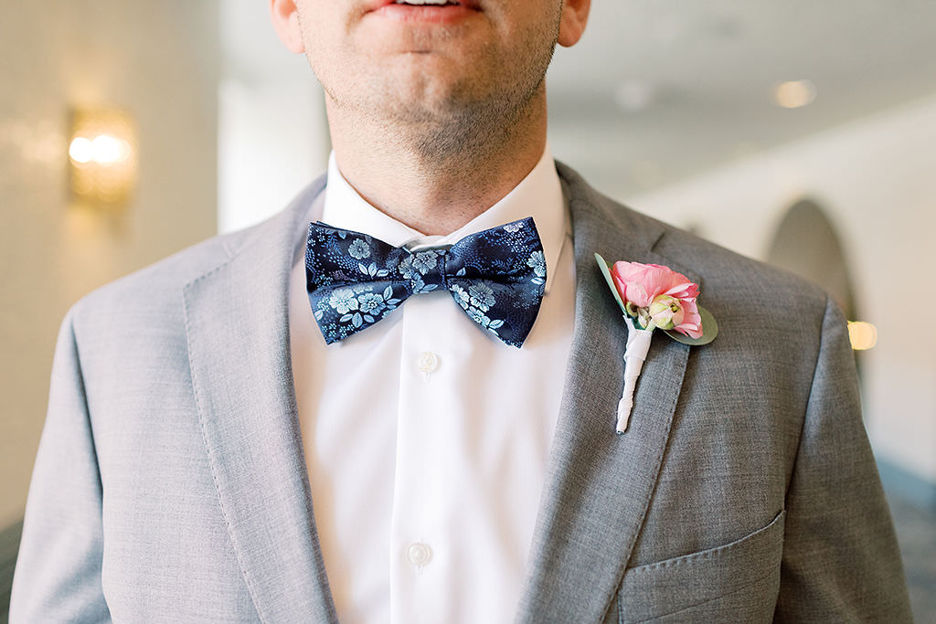 St. Petersburg Groom Wedding Portrait in Grey Suit with Navy Blue Paisley Floral Bowtie and Pink Flower Boutonniere
