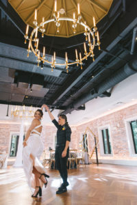 Florida Lesbian Gay Dancing Wedding Portrait in Modern Red Brick Wall Unique Downtown St. Pete Wedding Venue Red Mesa Events | Tampa Bay Wedding Photographer Kera Photography | Sarasota Wedding Dress Shop Truly Forever Bridal