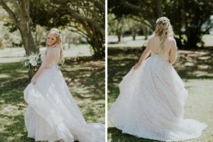 Florida Bride Beauty Wedding Portrait in Wtoo Watters Lace Ballgown Open Back Wedding Dress Holding Greenery and White Floral Bouquet and Greenery Floral Hair Piece Half Updo Style