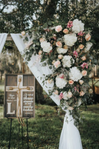 Rustic Chic Wedding Ceremony Decor, Arch with White Linen Draping, White Hydrangeas, Blush Pink Roses and Greenery Floral Arrangement | Tampa Wedding Planner Kelly Kennedy Weddings and Events