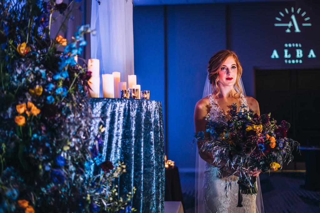 Florida Bride Wedding Portrait Holding Unique Creative Dark and Colorful Purple, Blue, and Orange Floral Bouquet | Tampa Bay Boutique Hotel Wedding Venue Hotel Alba | Wedding Planner Special Moments Event Planning | Wedding Hair and Makeup Michele Renee the Studio | Styled Shoot