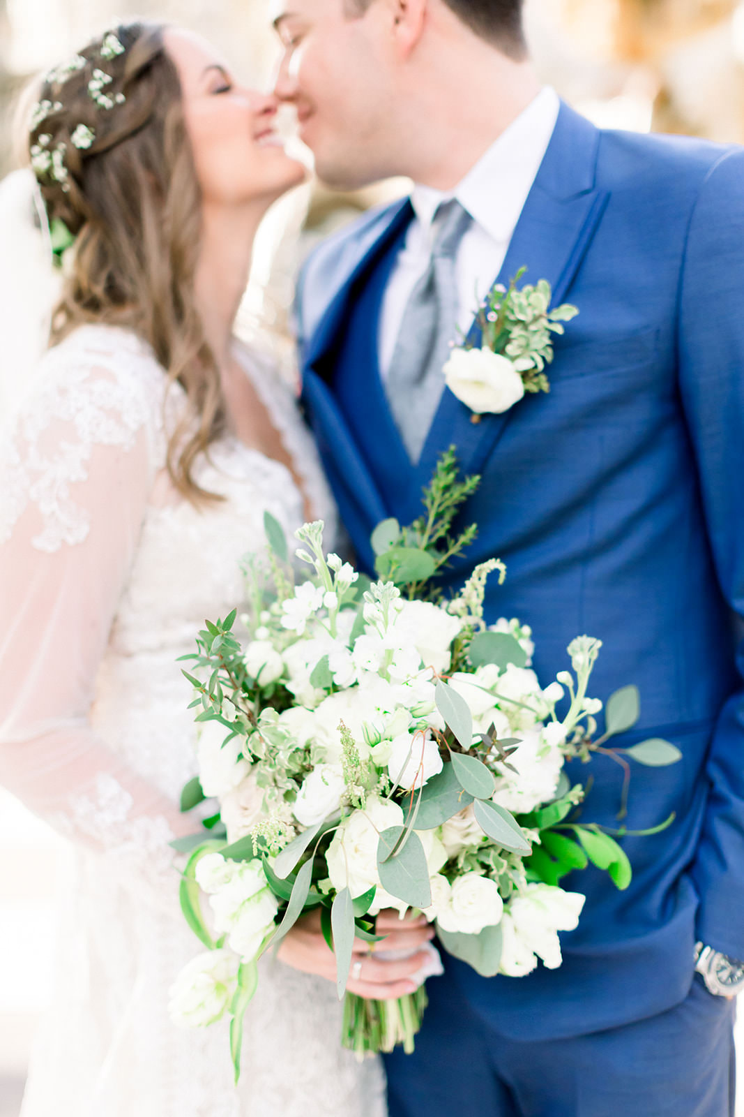 Elegant Tampa Bay Bride and Groom with White Floral Bouquet with Mix Stems, Eucalyptus Leafs, and Greenery | Tampa Bay Wedding Photographers Shauna and Jordon Photography