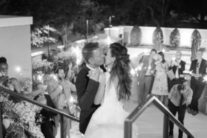 Classic Intimate Bride and Groom Outdoor Courtyard Black and White Wedding Exit Portrait