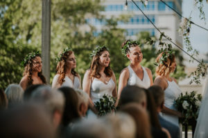 Tampa Bridesmaids Wedding Ceremony Portrait in Mix and Match White Dresses and Greenery Floral Crowns
