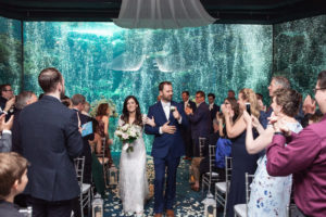 Bride and Groom Wedding Ceremony Recessional Portrait at Unique Downtown Tampa Venue The Florida Aquarium