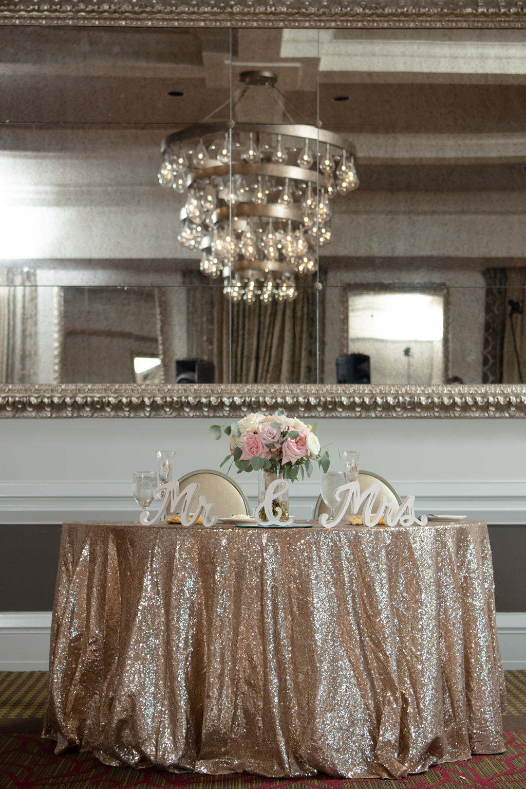 Elegant, Modern Wedding Reception Decor, Sweetheart Table with Gold Sequined Linens, Mr. and Mrs. Tabletop Decor, Blush Pink Roses, Ivory Florals in Modern Ballroom at Boutique St. Pete Hotel The Birchwood | Tampa Bay Wedding Planner Coastal Coordinating