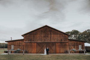 Florida Bride and Groom Outdoor Barn Wedding Portrait | Tampa Rustic Wedding Venue Rafter J Ranch | Tampa Wedding Planner Kelly Kennedy Weddings and Events