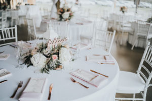 Rustic Chic Wedding Reception Decor, Round Tables with White Tablecloth, White Chiavari Chairs, Rose Gold Laser Cut Table Number, Blush Pink Linen Napkins, White Hydrangeas, Blush Pink Roses, Greenery Floral Low Centerpiece | Tampa Wedding Planner Kelly Kennedy Weddings and Events