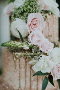 Whimsical Blush Pink with Gold Drip Wedding Cake and Cascading Blush Pink and White Roses with Greenery Accents Wedding Cake | St. Pete Wedding Cake Bakery The Artistic Whisk