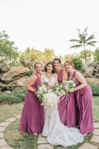 Elegant Classic Bridal Party Outdoor Garden Wedding Portrait, Bridesmaids in Matching Magenta Dresses with Whimsy Ivory, White, Blush Pink and Greenery Floral Bouquets | Tampa Bay Wedding Planner and Florist John Campbell Weddings | St. Petersburg Unique Wedding Venue Salvador Dali Museum