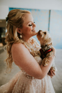 Tampa Bay Bride Beauty Wedding Portrait with Yorkie Dog Kissing