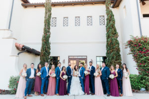 Florida Bride, Groom, Bridesmaids in Mix and Match Blush Pink and Maroon Floor Length Dresses, Groomsmen in Blue Suits Wedding Party Portrait | Tampa Wedding Venue Westshore Yacht Club