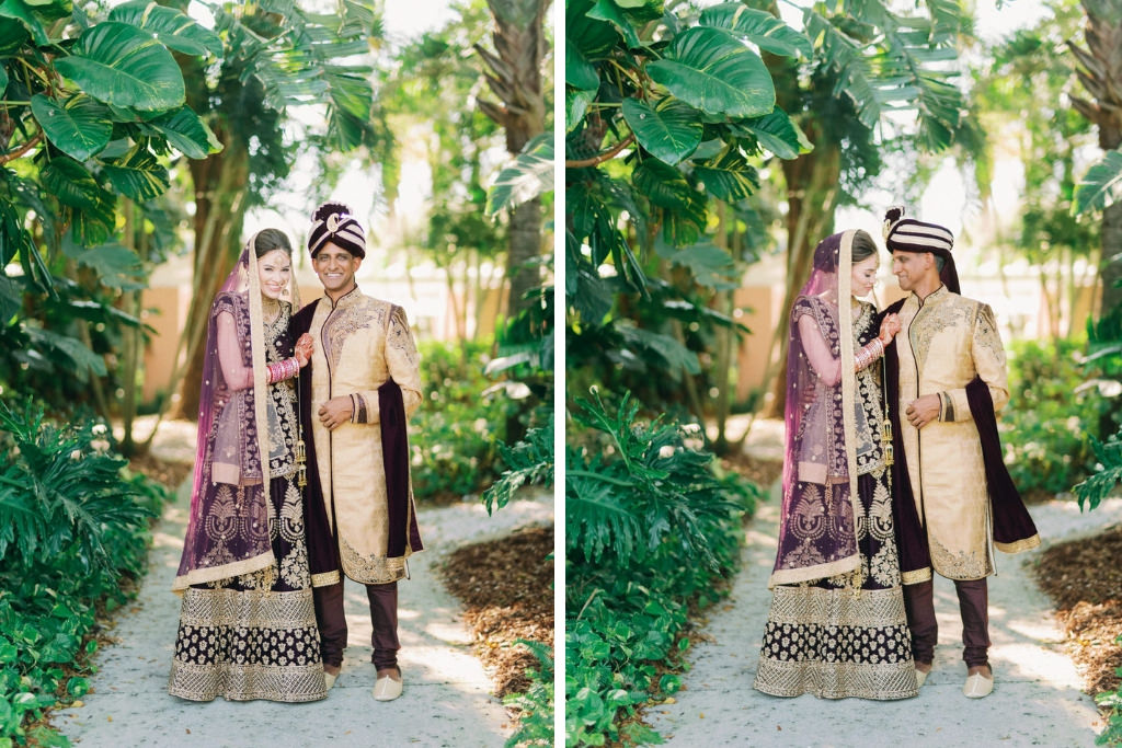 Tampa Traditional Indian Hindu Bride and Groom First Look Wedding Portrait, Groom in Black and Gold Sherwani Turban, Bride in Custom Purple Velvet and Gold Lehenga