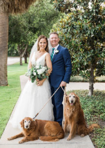 Tampa Bride and Groom with Golden Retriever Dogs Wedding Portrait, Bride Holding Organic Greenery and White, Ivory Rose Floral Bridal Bouquet | Golden Retriever Wedding Portraits