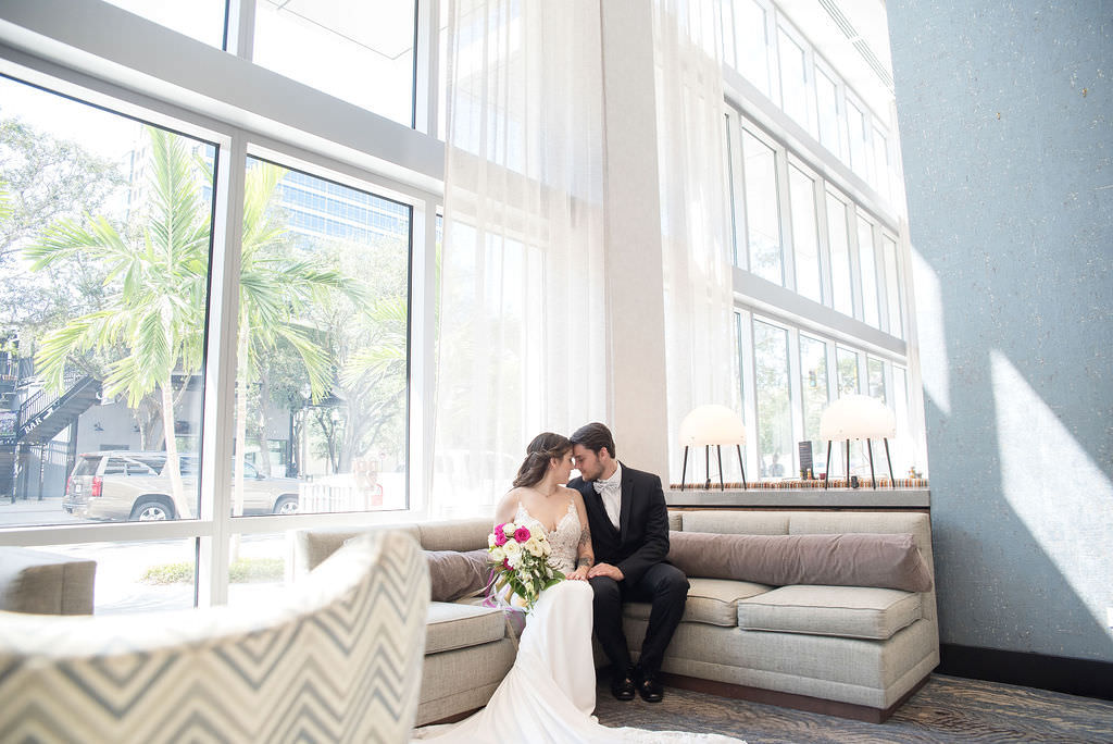 Florida Bride and Groom Hotel Lobby Wedding Portrait |Tampa Bay Wedding Photographer Kristen Marie Photography | Hotel Wedding Venue Hyatt Place Downtown St. Pete | Wedding Attire Nikki's Glitz and Glam Boutique | Wedding Hair and Makeup LDM Beauty Group | Wedding Florist Brides N Blooms