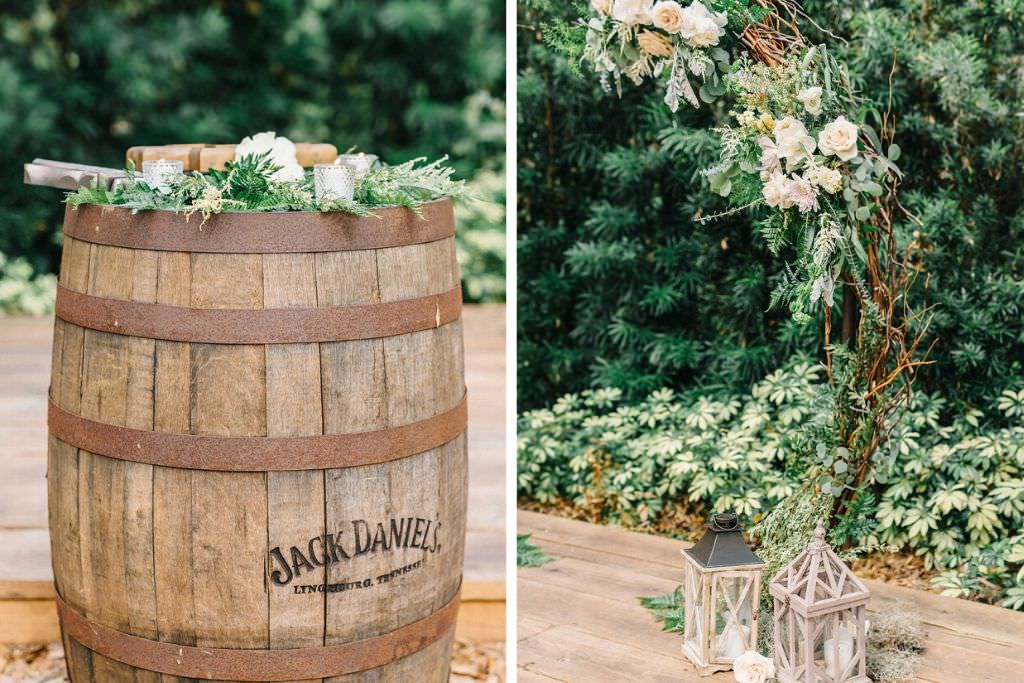 Rustic Wedding Decor and Outdoor Ceremony Details, Jack Daniels Barrel at Alter, Antique Lanterns, Under Circular Ceremony Arch made of Sticks, Twigs, Leaves, Stems, Ivory Roses, Blush Pink Flowers, White Florals | Tampa Bay Wedding Venue Florida Rustic Barn Weddings