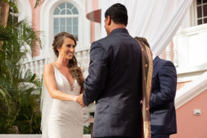 Tampa Bay Bride and Groom Exchange Vows in outdoor ceremony | St. Pete Beach Luxury Wedding Venue The Don CeSar