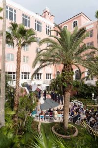 Tampa Bay Bride and Groom Exchange Vows in outdoor Garden Ceremony | St. Pete Beach Luxury Wedding Venue The Don CeSar