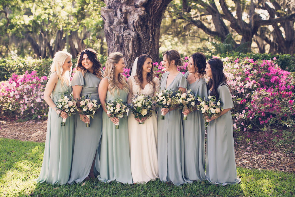 South Tampa Bride and Bridal Party Outdoor Wedding Portrait, Bridesmaids in Long Mix and Match Mint Crisp Show Me Your MuMu Dresses, Holding Rustic Chic Floral Bouquets with White and Blush Pink Roses with Greenery | Florida Luxury Wedding Photographer Luxe Light Images