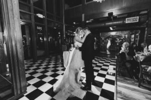 Romantic Black and White Bride and Groom First Dance Wedding Portrait | St. Pete Wedding Venue Station House | Wedding Dress Shop Isabel O'Neil Bridal Collection