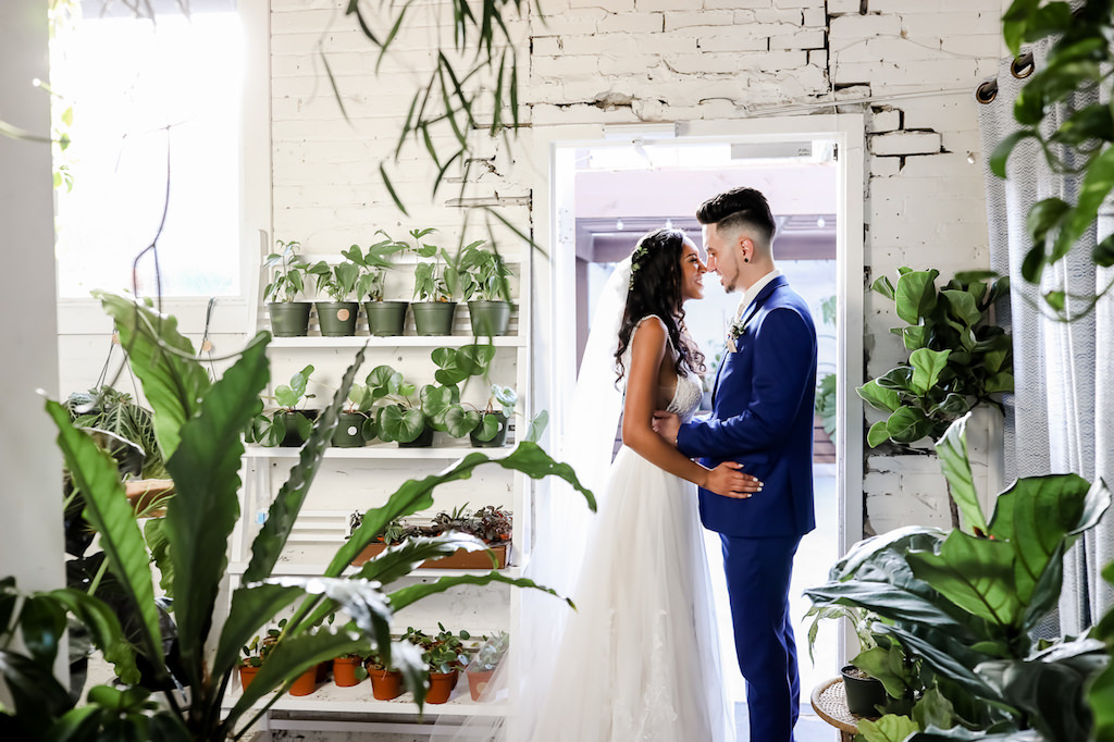 Romantic Bride and Groom Wedding Portrait in Plant Nursery | Tampa Bay Wedding Photographer Lifelong Photography Studio | Unique Wedding Ceremony Venue Fancy Free Nursery