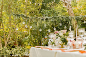 St. Pete Garden Inspired Outdoor Wedding Reception Decor, Hanging Eucalyptus, Hanging Green Amaranthus and Hanging Glass Sphere Bulbs with Candles