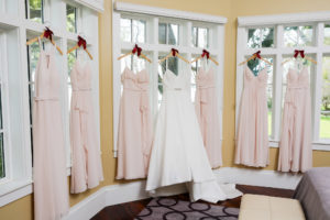 Classic A-Line V Neck with Straps and Rhinestone Belt Justin Alexander Wedding Dress, Blush Pink Mix and Match Azazie Bridesmaid Dresses