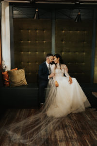 Romantic Bride in Long Sleeve Vera Wang High-Neck Lace and Tulle Wedding Dress with Full Length Veil | St. Petersburg Wedding Venue Station House