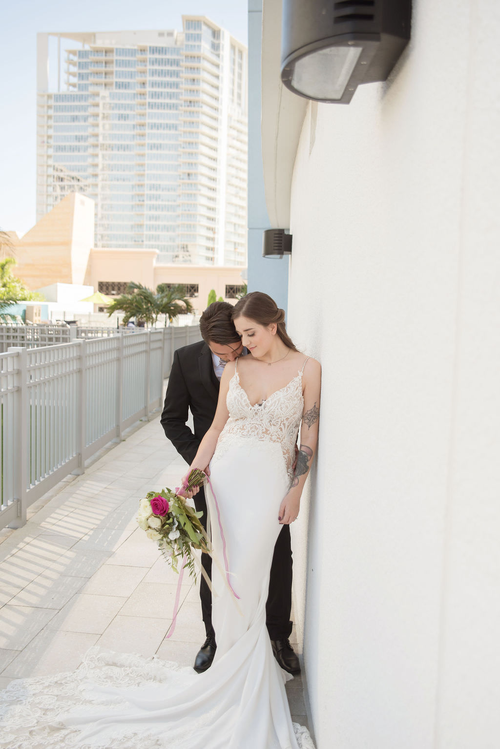 Bride in Low V Neckline Lace and Illusion with Spaghetti Straps Wedding Dress | Tampa Wedding Dress Shop Nikki's Glitz and Glam Bridal Boutique | Tampa Bay Wedding Photographer Kristen Marie Photography | Hyatt Place Downtown St. Pete Wedding Venue