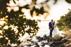 Romantic Waterfront Florida Sunset Bride and Groom Wedding Portrait