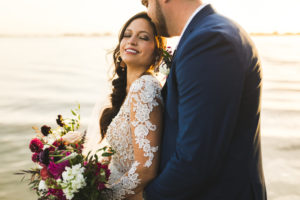Romantic Boho Chic Bride and Groom Waterfront Sunset Wedding Portrait | Tampa Bay Wedding Hair and Makeup Femme Akoi Beauty Studio