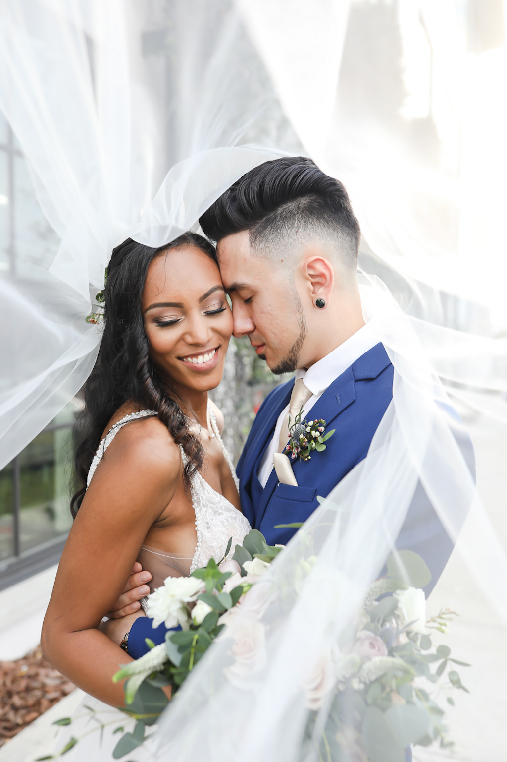 Creative Bride and Groom Veil Blowing in the Wind Wedding Portrait | Tampa Wedding Photographer Lifelong Photography Studio