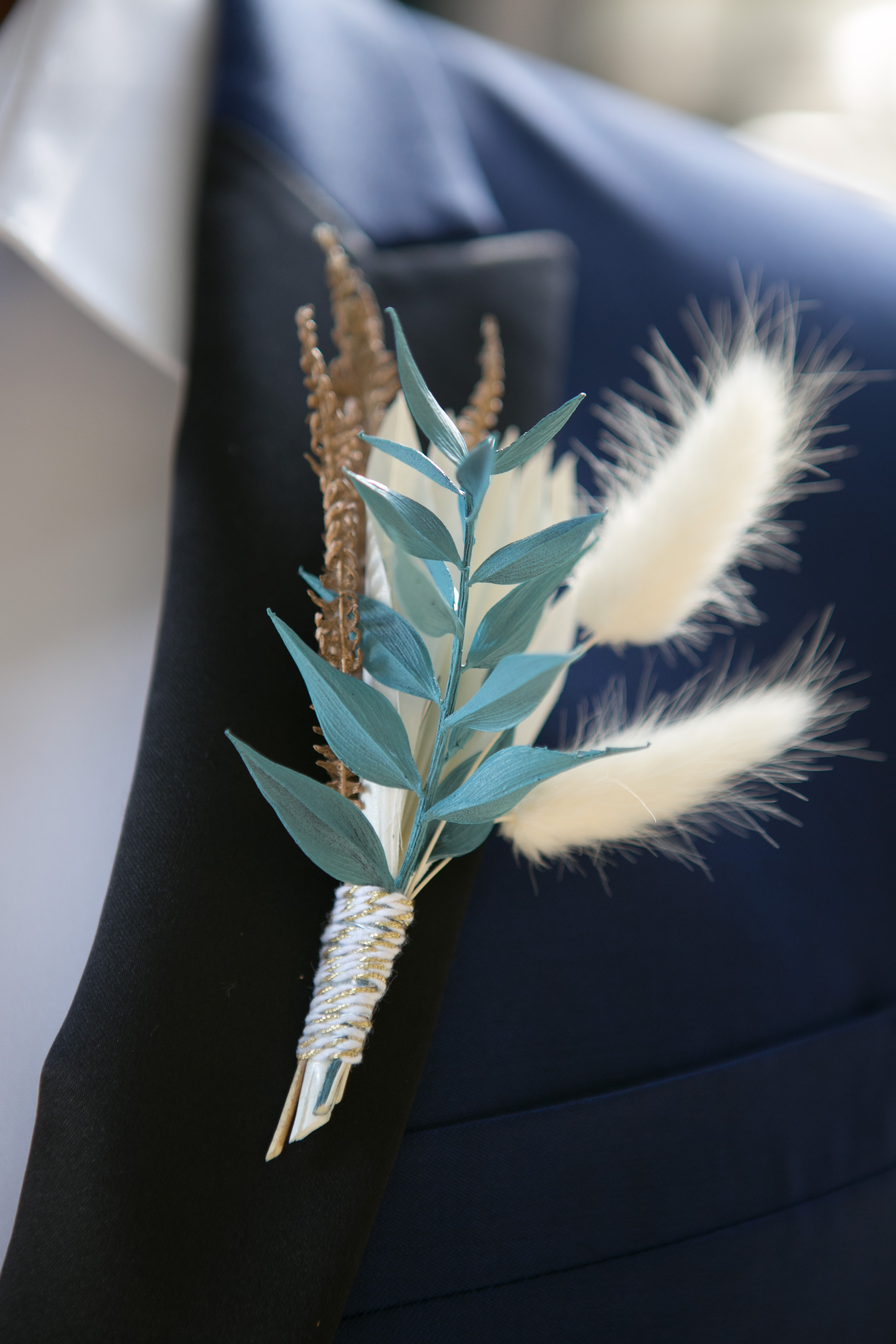 Unique Tropical Greenery and Floral Groom Boutonniere | Tampa Bay Wedding Photographer Carrie Wildes Photography | Wedding Planner and Florist John Campbell Weddings