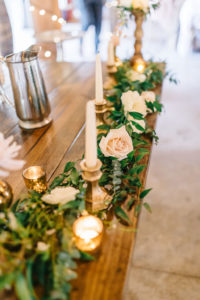 Whimsical Garden Rustic Inspired Wedding Decor and Reception Details, Greenery Garland with Blush Pink Roses and Candlelight |Tampa Wedding Caterer Catering By The Family