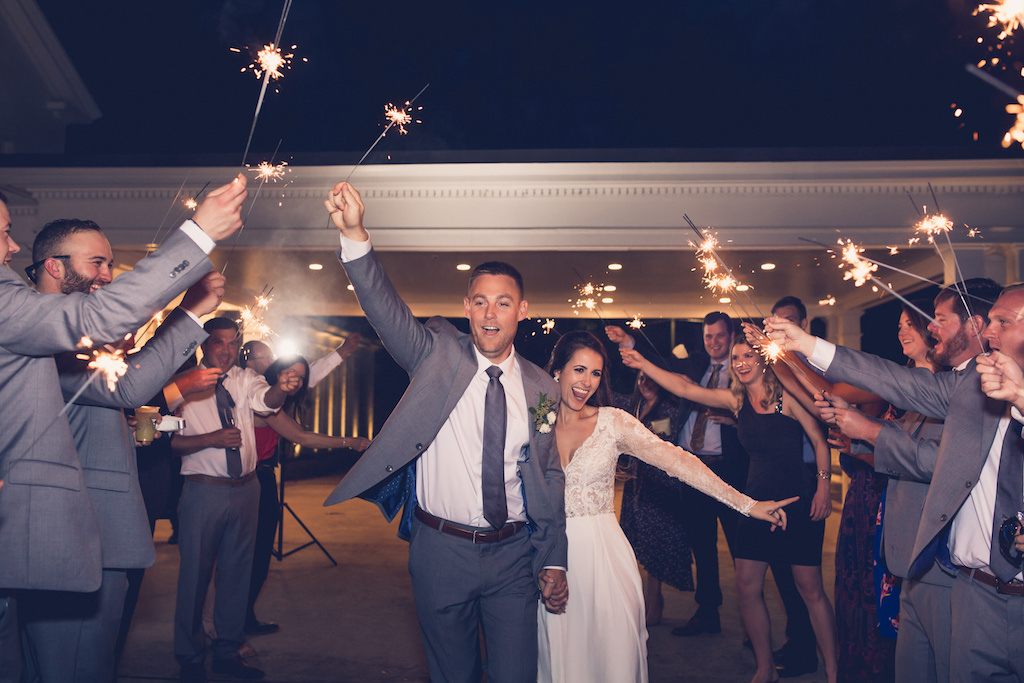 Florida Bride and Groom During Midnight Sparkler Exit | Tampa Bay Wedding Photographer Luxe Light Images | Wedding Venue Tampa Yacht and Country Club