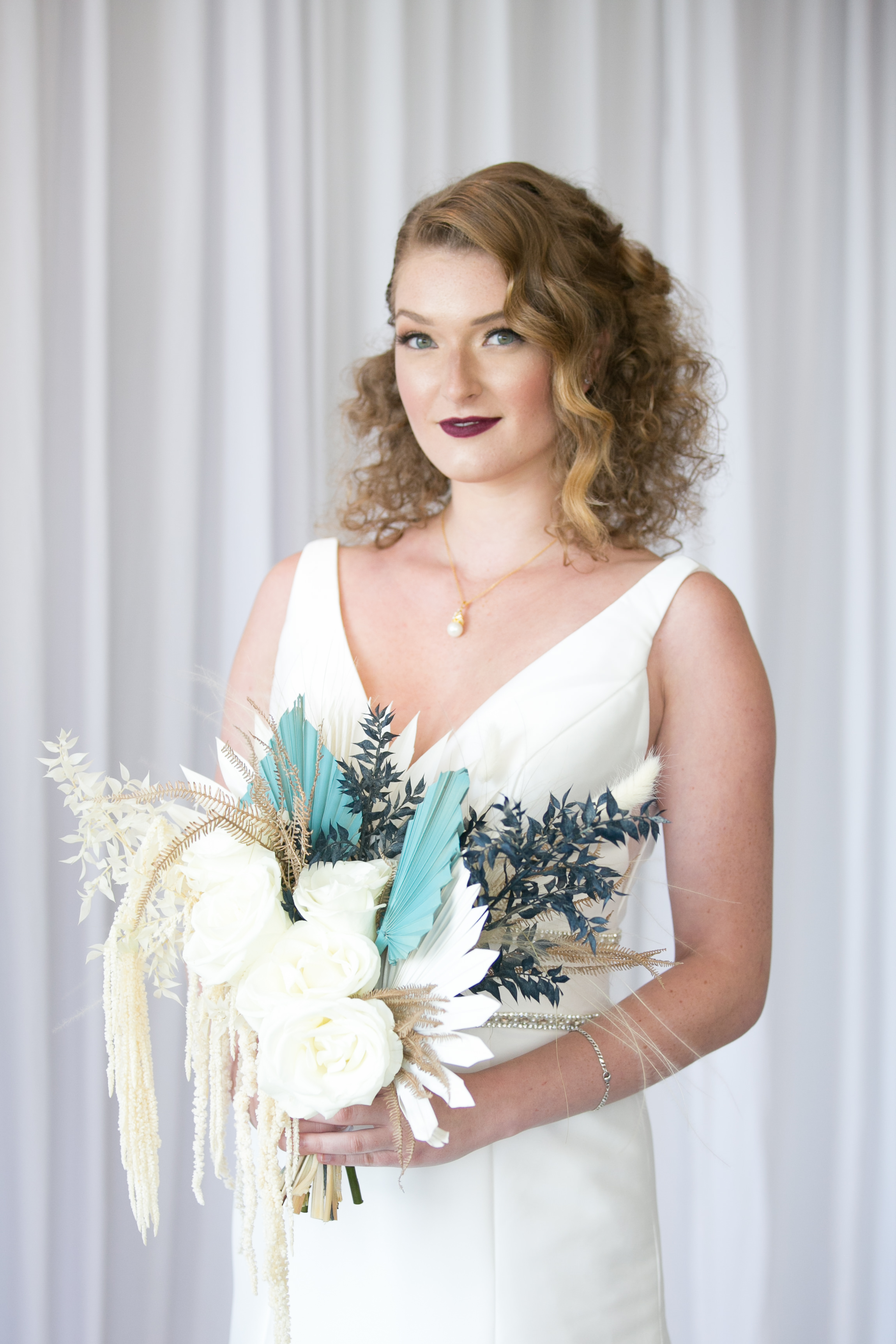 Classic Bride Beauty Wedding Portrait in A-Line V Neck Wedding Dress Holding Unique White Roses, Ivory Accent and Greenery Floral Bridal Bouquet |Tampa Bridal Wedding Dress Boutique Truly Forever Bridal | South Tampa Bridal Hair and Makeup Michele Renee the Studio | Wedding Planner and Florist John Campbell Weddings