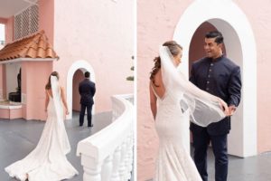 Florida Bride and Groom First Look in front of Pink Palace, Groom Wearing Navy Punjabi, Bride Wearing Hayley Paige Fit and Flare Wedding Dress | The Don CeSar Resort in St. Pete Beach