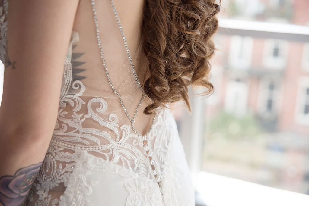 Elegant Illusion and Lace Low Open Back with Rhinestone Lining Wedding Dress | Tampa Bay Wedding Photographer Kristen Marie Photography | Wedding Attire Nikki's Glitz and Glam Boutique