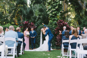 Fun Bride and Groom Sealing It With A Kiss Wedding Ceremony Portrait | Tampa Bay Wedding Photographer Kera Photography | St. Petersburg Wedding Venue Sunken Gardens