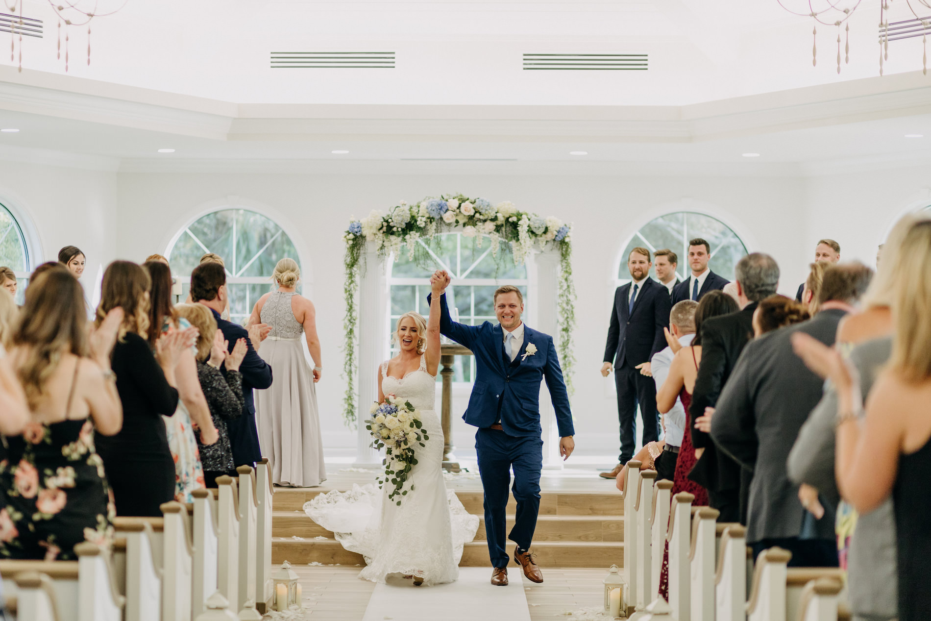 Classic Florida Bride and Groom After Saying I Do Excited Wedding Portrait | Tampa Wedding Ceremony Venue Harborside Chapel