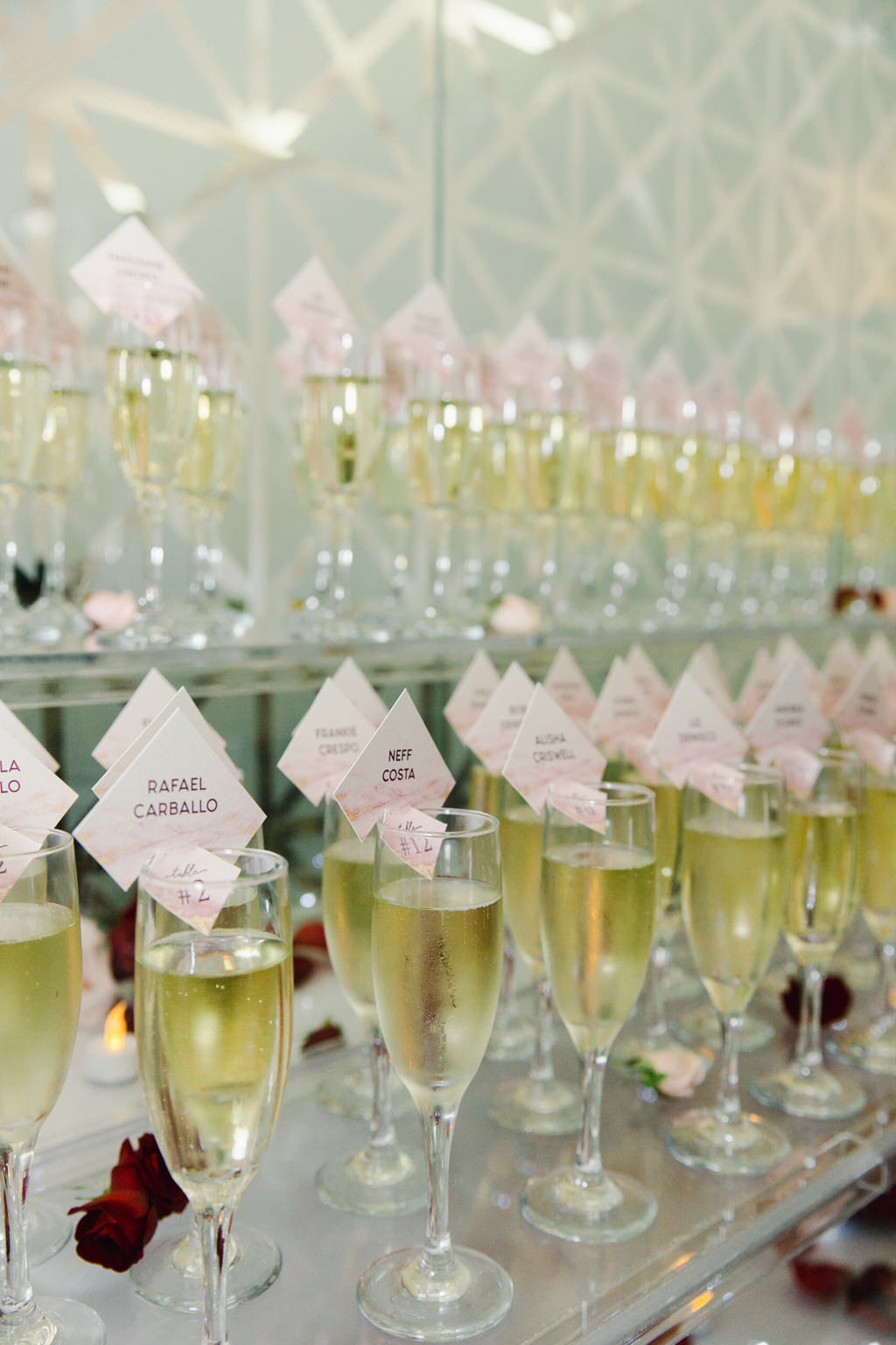 Modern Wedding Reception Unique Seating Cards on Glasses of Champagne