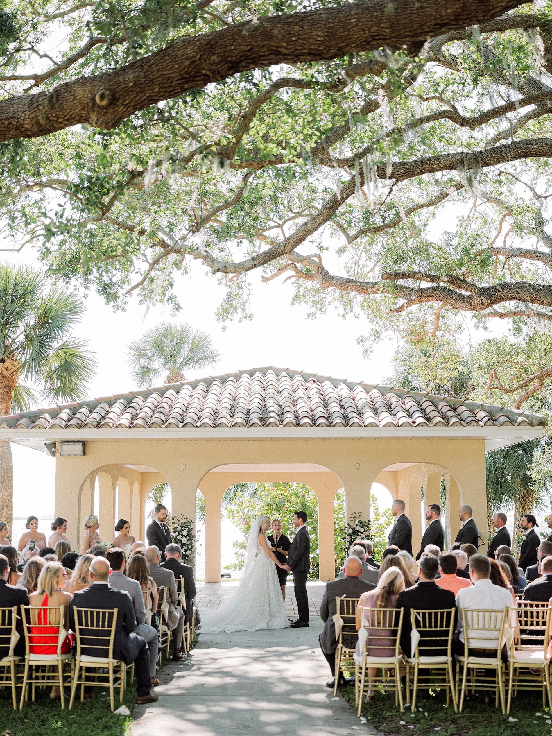 Florida Bride and Groom Exchanging Wedding Vows Wedding Ceremony Portrait | Sarasota Wedding Venue Powel Crosley Estate