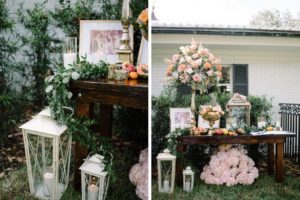 Romantic Whimsical Wedding Reception Decor, Rustic Wooden Table with Eucalyptus Garland, Fruits, Candles, Tall Gold Candlestick with Blush Pink, Orange Roses, Dusty Miller and Greenery Floral Arrangement, White Lanterns, Blush Pink Hydrangeas | Tampa Bay Wedding Florist Bruce Wayne Florals | St. Petersburg Wedding Rentals Gabro Event Services
