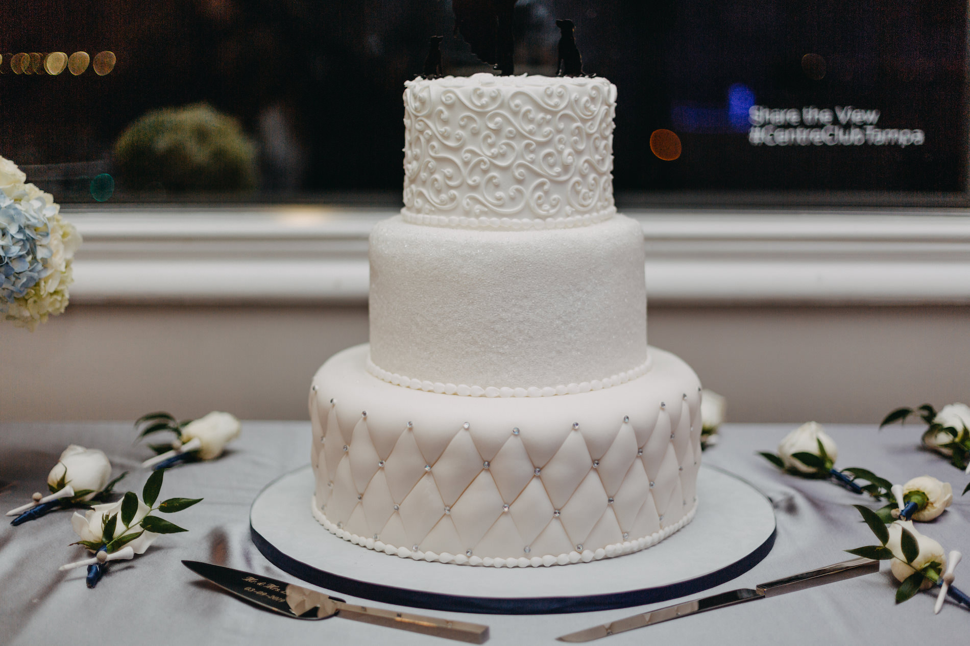 Classic White Three Tier Wedding Cake with Quilted Design and Rhinestone Embellishments and Swirl Frosted Design | Tampa Bay Wedding Cake Alessi Bakery