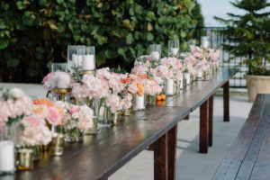 Whimsical Romantic Wedding Reception Decor, Long Rustic Wooden Feasting Table, Blush Pink Roses Floral Arrangements, Gold Candlesticks | St. Pete Wedding Rentals Gabro Event Services | Tampa Wedding Florist Bruce Wayne Florals