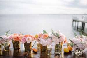 INSTAGRAM Whimsical Romantic Wedding Reception Decor, Blush Pink Hydrangeas, Orange Roses and Peonies in Low Gold Vases and Lemon and Orange Fruits | St. Petersburg Waterfront Wedding Reception | Tampa Bay Wedding Florist Bruce Wayne Florals | Wedding Rentals Gabro Event Services