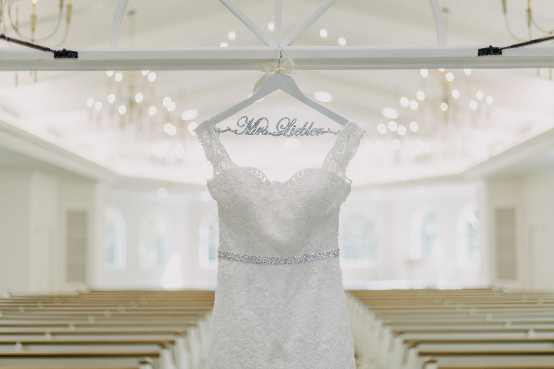 Classic Lace Sweetheart Neckline with Lace Straps Classic Ashley & Justin Wedding Dress with Rhinestone Belt on Personalized Hanger | Harborside Chapel